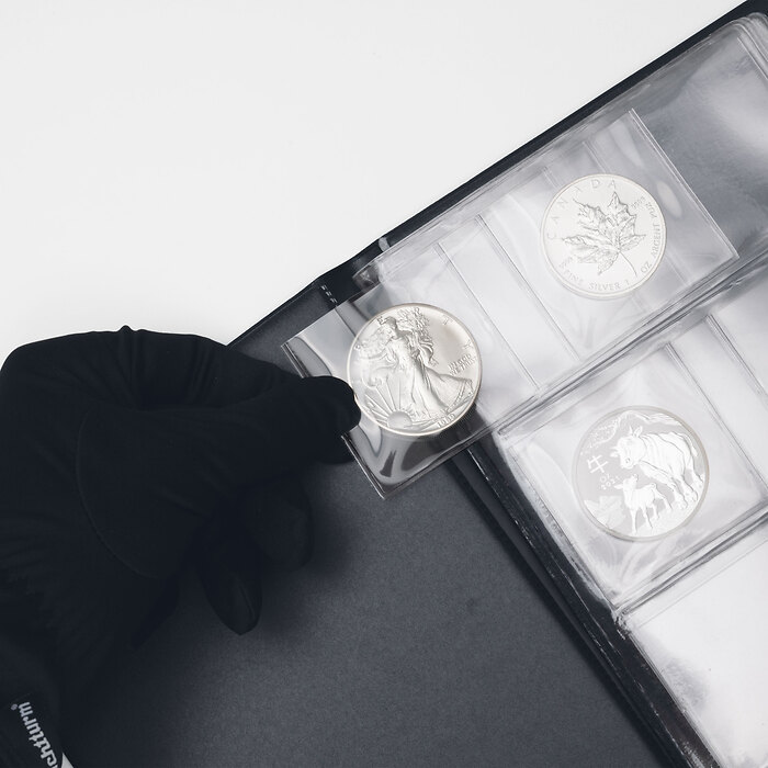 Album de poche pour 48 pièces  en argent, jusqu'à 41mm de diamètre, noir